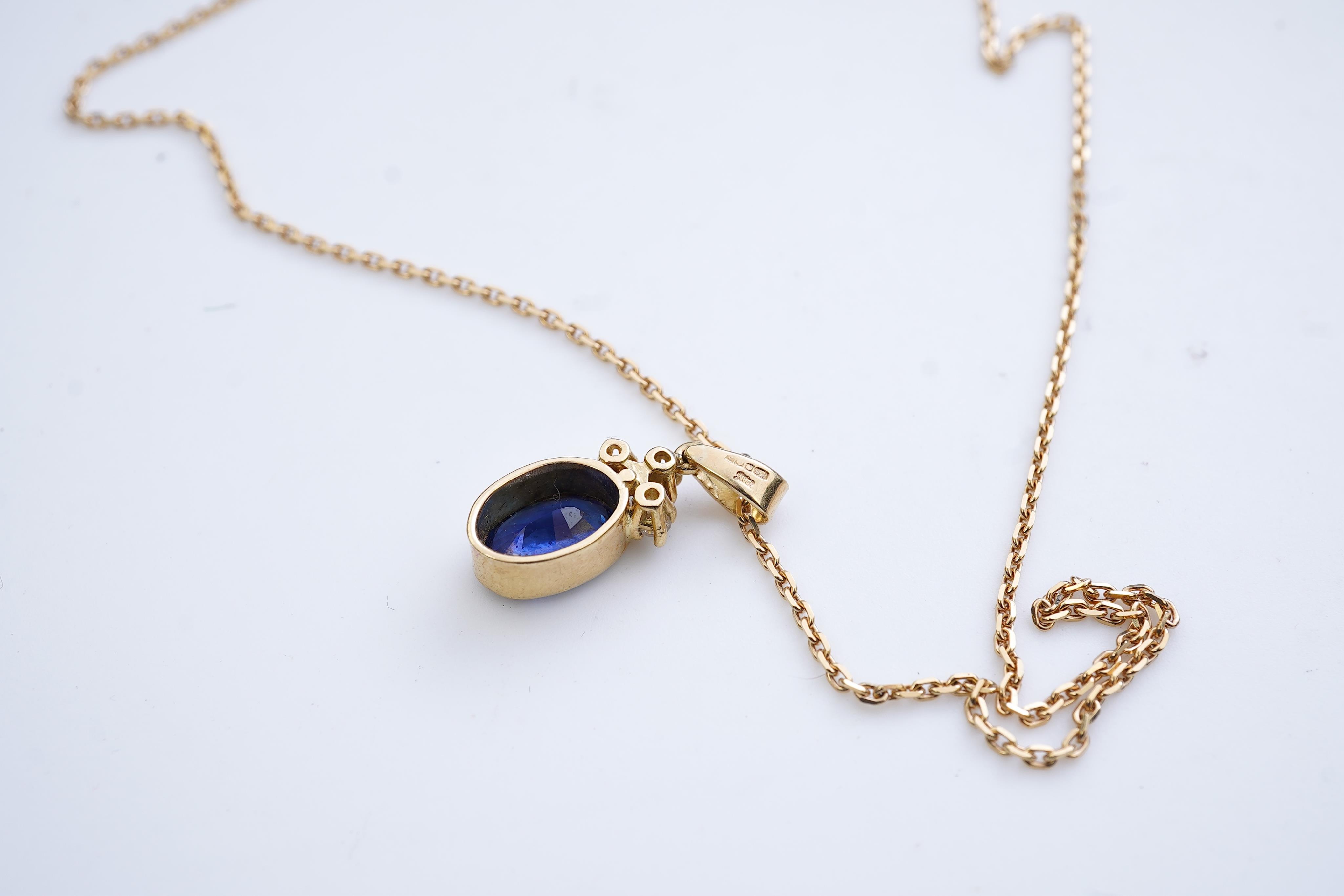 A sapphire and diamond pendant